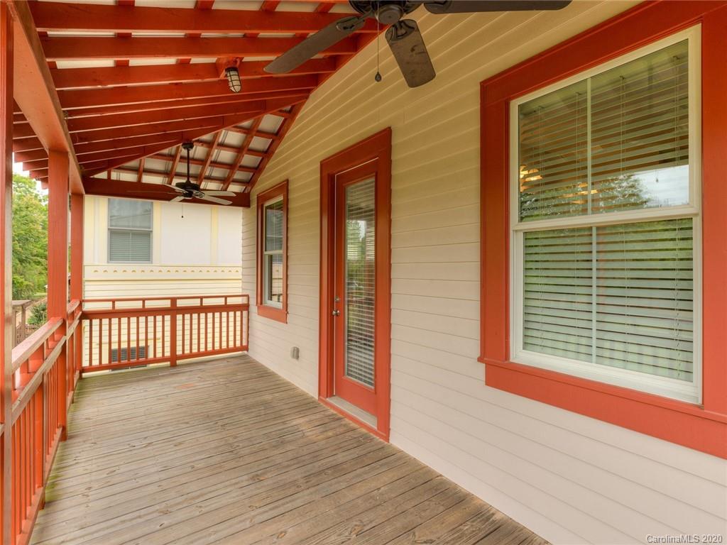 209 Coneflower Place Fort Mill, SC 29708 - Photo 45 of 48 a view of a porch with wooden floor and a window