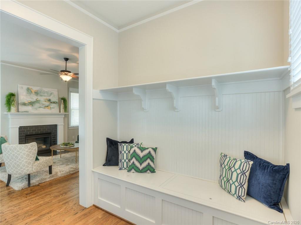 209 Coneflower Place Fort Mill, SC 29708 - Photo 8 of 48 a living room with furniture and a fireplace