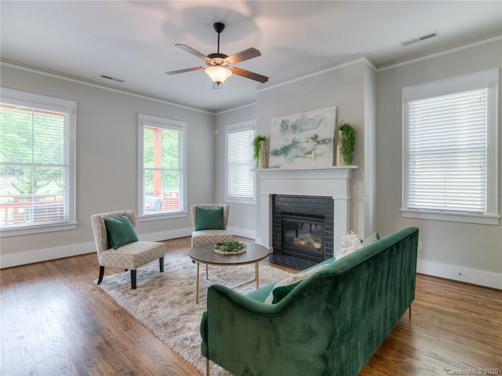 209 Coneflower Place Fort Mill, SC 29708 - Photo 10 of 48 a living room with furniture and a fireplace