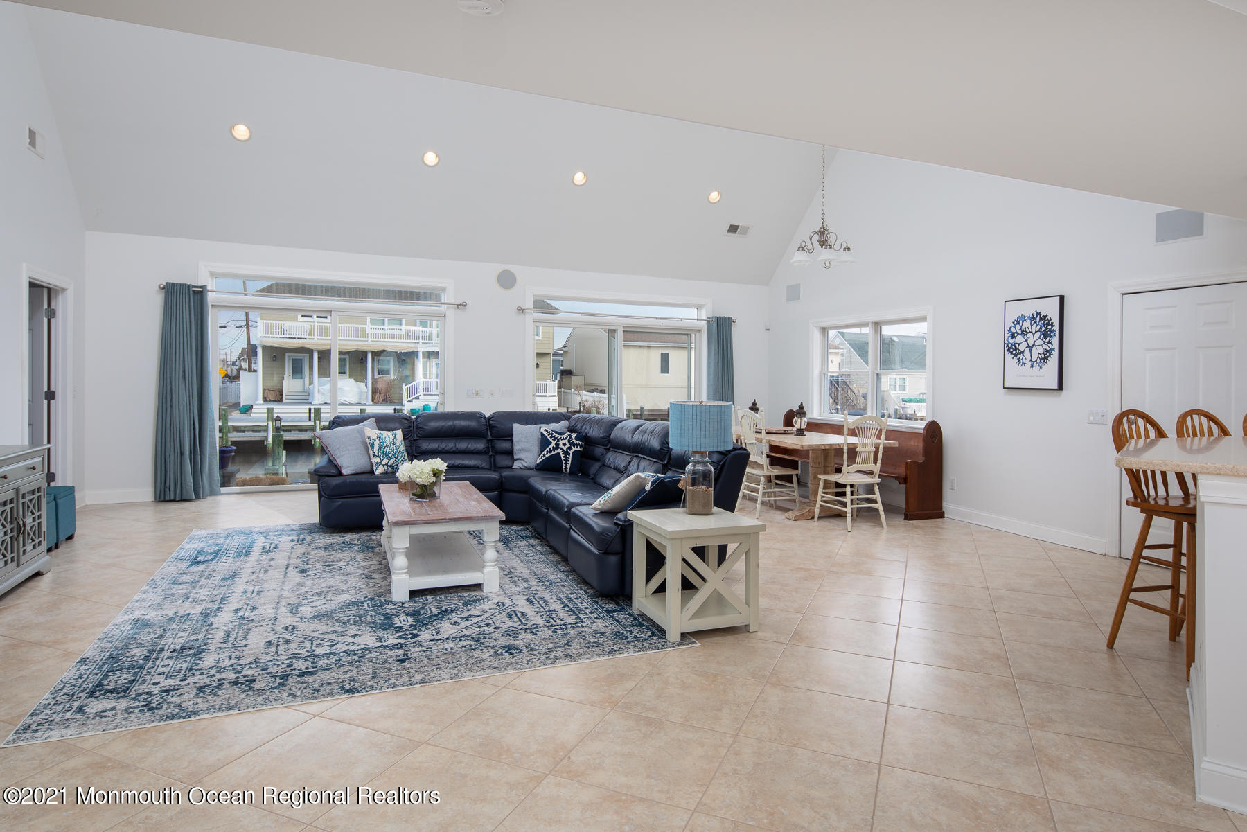 304 Cutter Lane Mantoloking, NJ 08738 - Photo 13 of 54 a living room with furniture and a rug