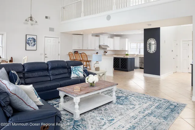a living room with a couch and a table