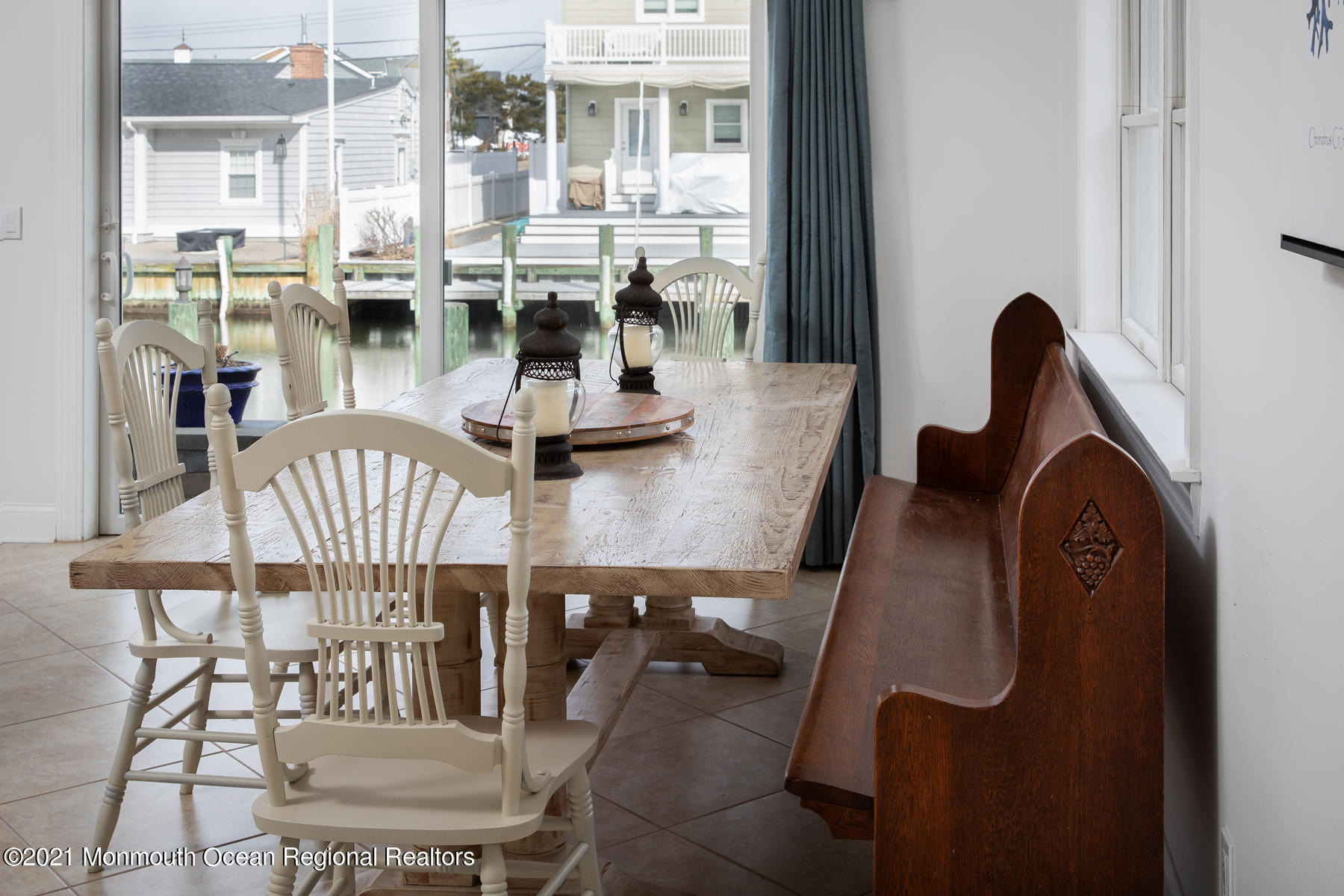304 Cutter Lane Mantoloking, NJ 08738 - Photo 22 of 54 a dining room with furniture and wooden floor