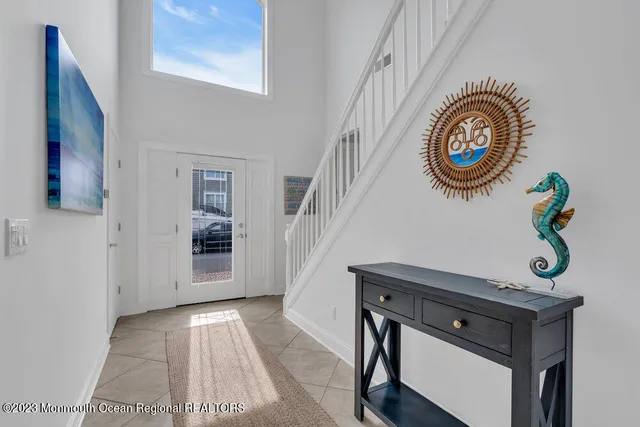 a view of entryway with a front door