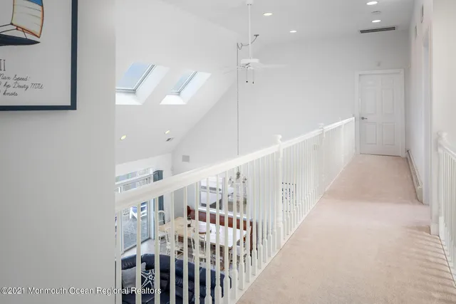 a view of a chairs and table in the backyard
