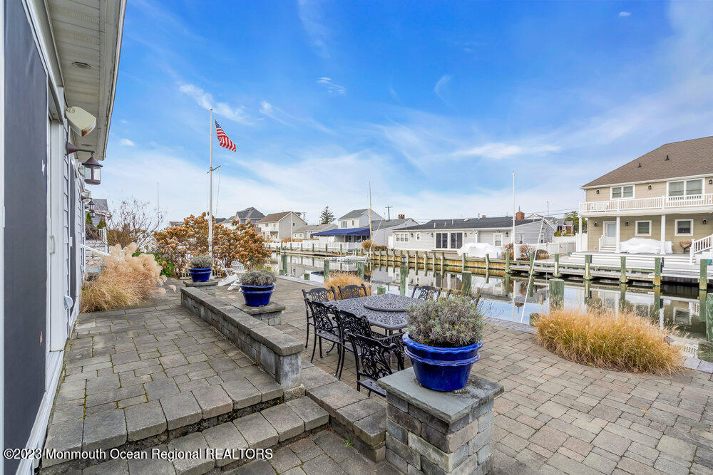 304 Cutter Lane Mantoloking, NJ 08738 - Photo 52 of 54 a view of a terrace with seating space