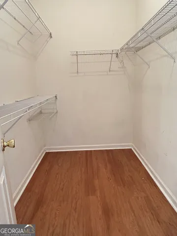 a view of a room with racks on the wall