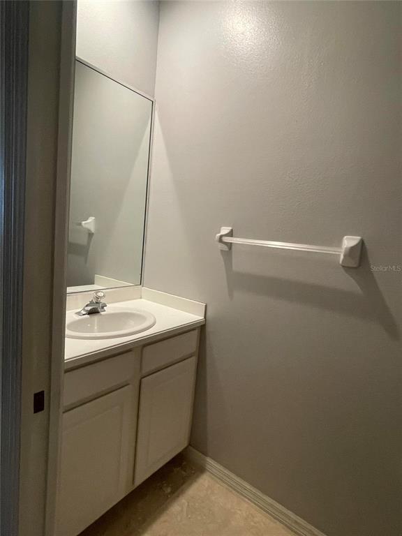 759 Fordingbridge Way Osprey, FL 34229 - Photo 25 of 51 a bathroom with a sink and mirror