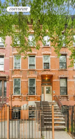 a front view of a multi story residential apartment building