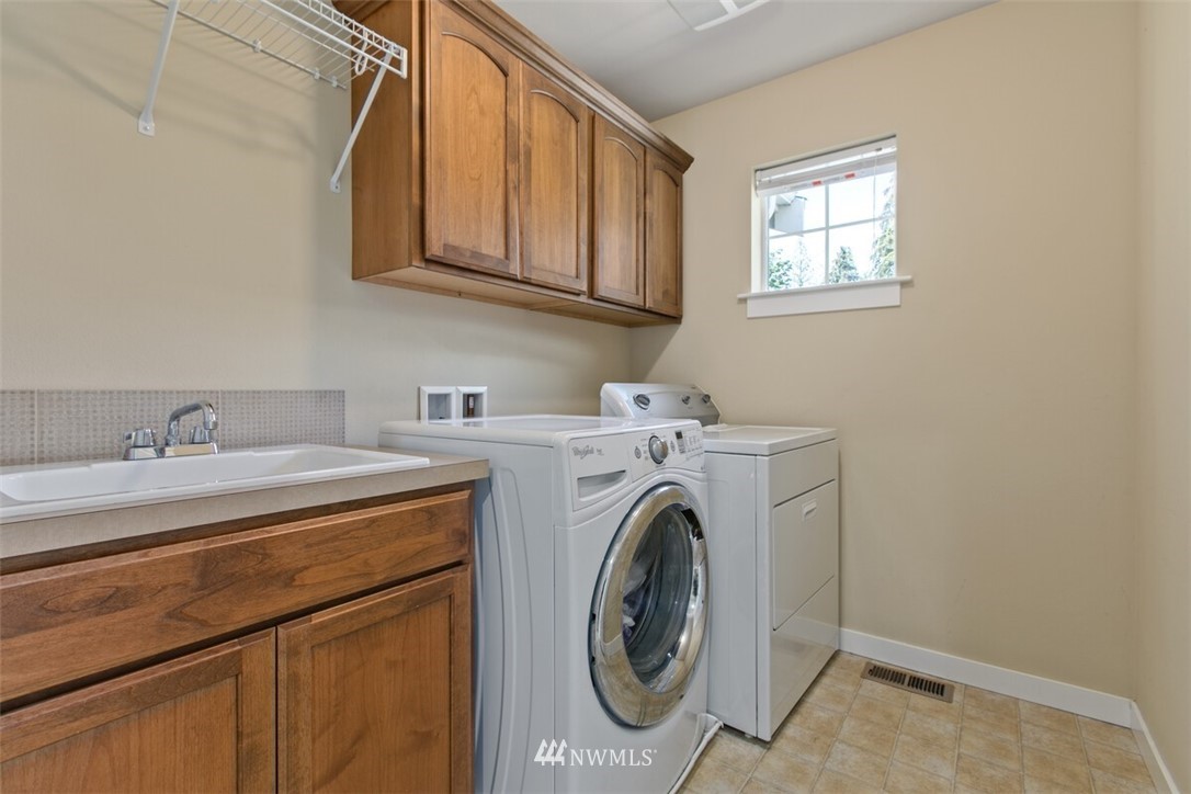 21703 31st Drive Southeast Bothell, WA 98021 - Photo 23 of 34 a utility room with dryer and washer