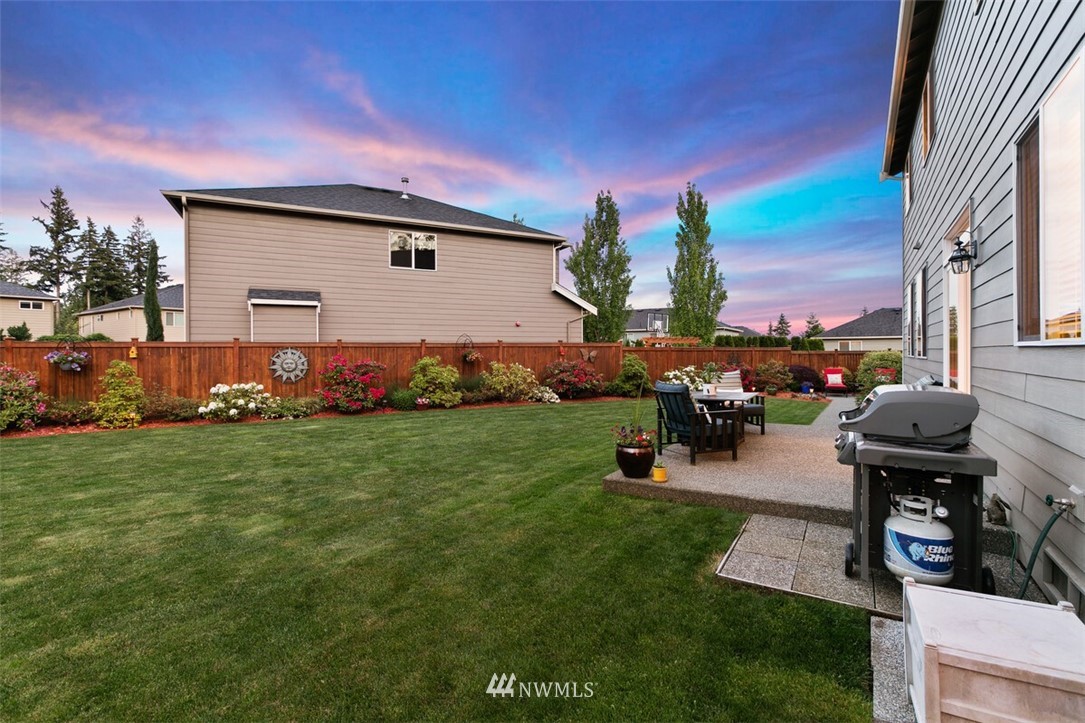 21703 31st Drive Southeast Bothell, WA 98021 - Photo 26 of 34 a front view of house with yard and outdoor seating