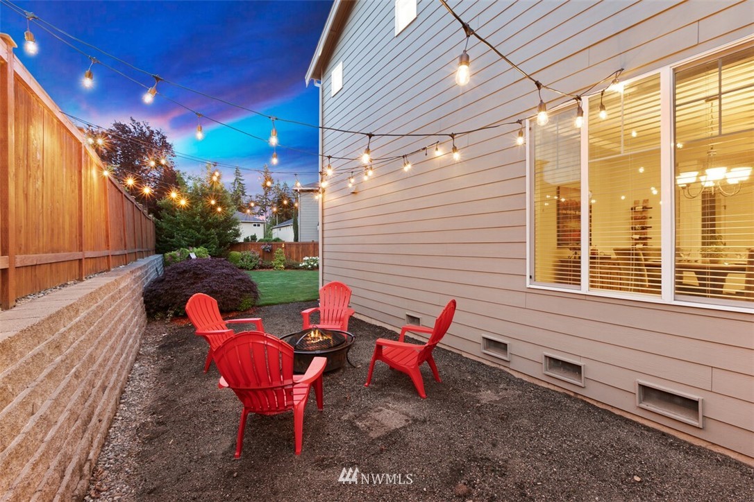 21703 31st Drive Southeast Bothell, WA 98021 - Photo 30 of 34 a backyard of a house with outdoor seating