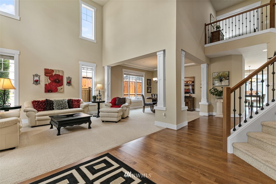 21703 31st Drive Southeast Bothell, WA 98021 - Photo 4 of 34 a living room with furniture and a wooden floor