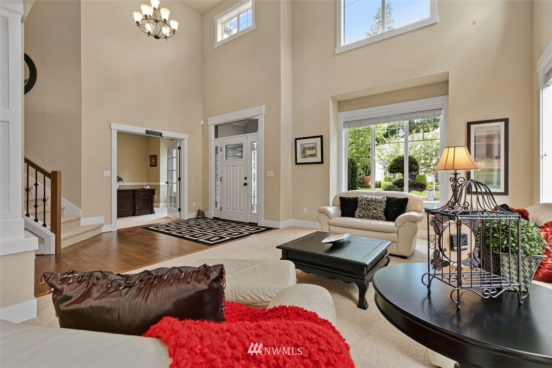 21703 31st Drive Southeast Bothell, WA 98021 - Photo 6 of 34 a living room with furniture and a table