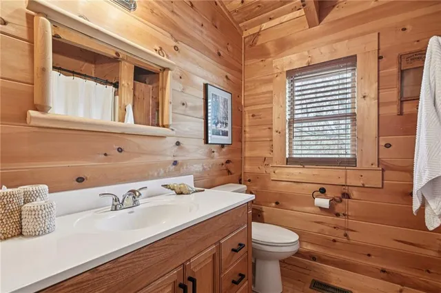 a bathroom with a sink and a toilet
