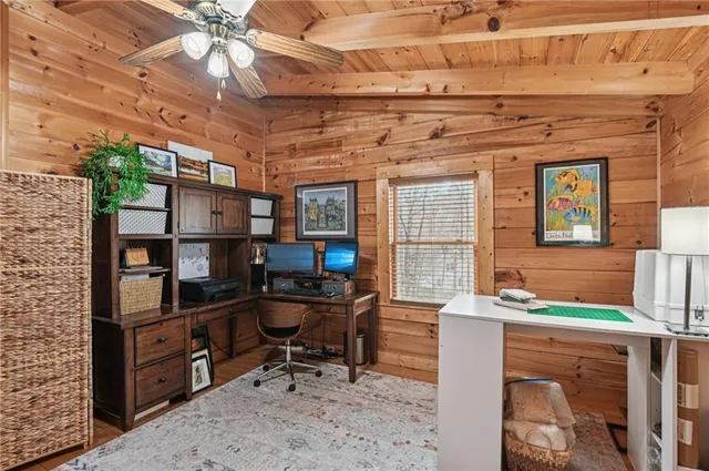 a view of a workspace with furniture