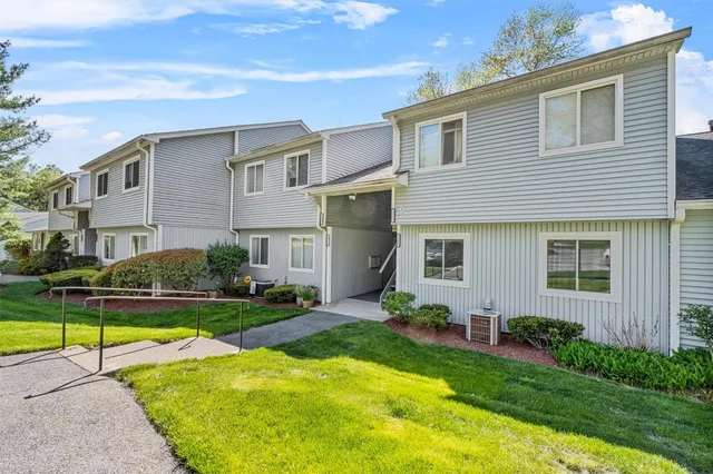a view of a house with a swimming pool