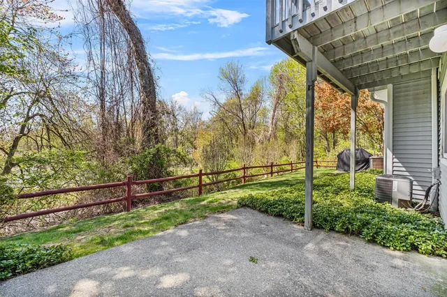 a view of a lake with houses in the background