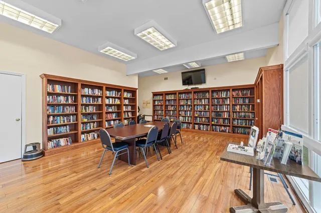 a view of swimming pool with a yard