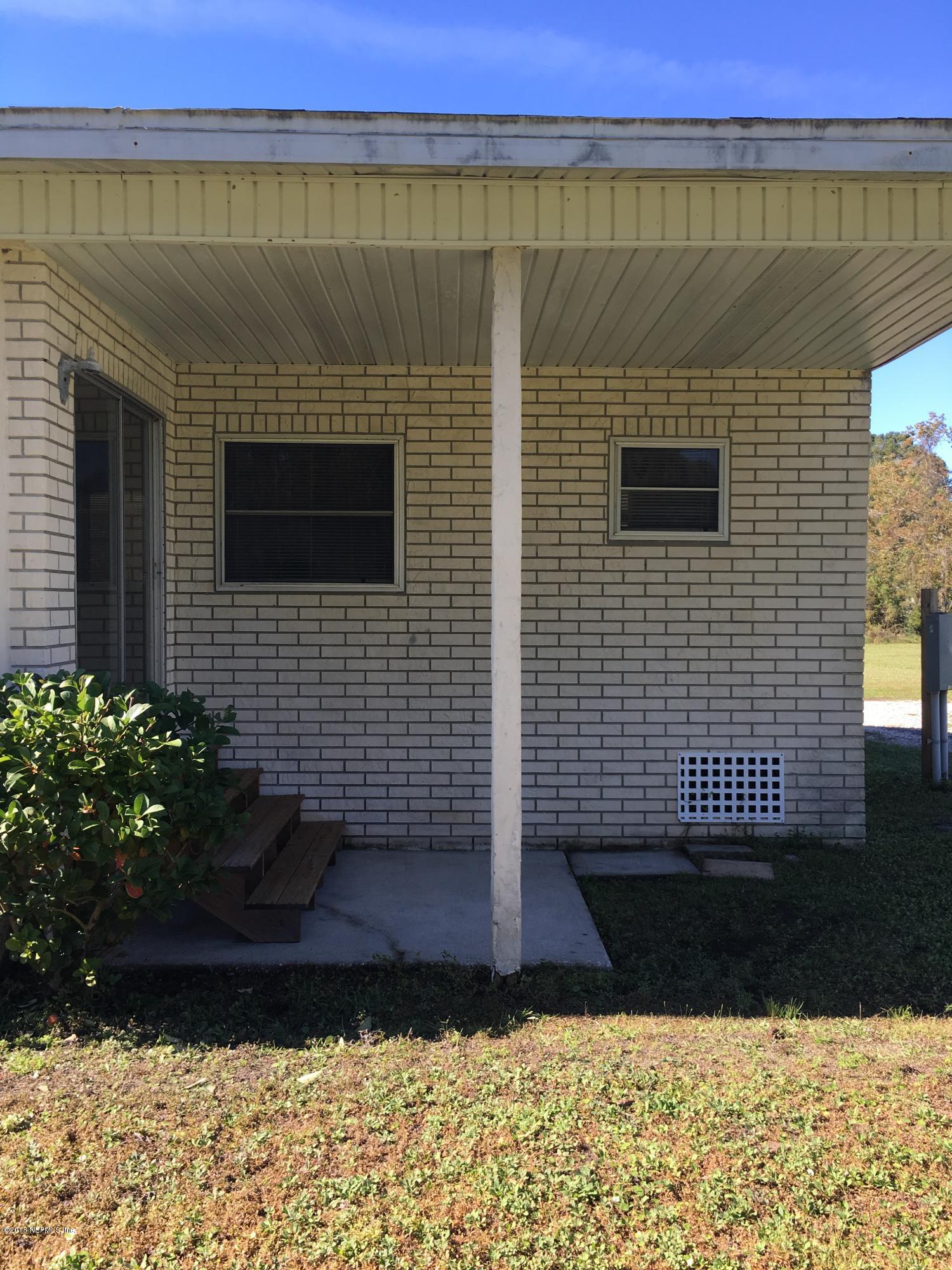 54199 Roy Booth Road Callahan, FL 32011 - Photo 20 of 23 a view of a terrace