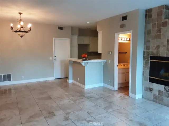 a view of kitchen and chandelier