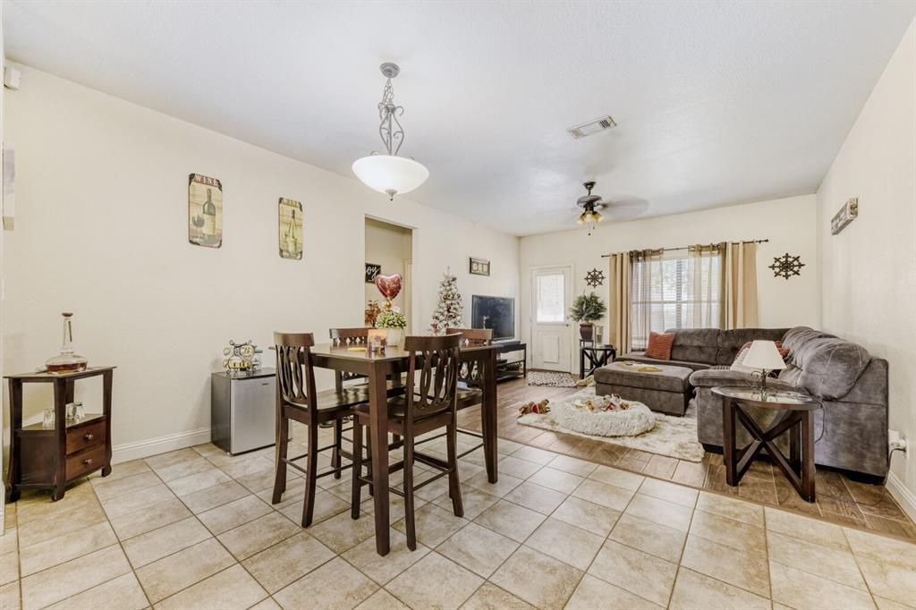 6525 Greenway Road Fort Worth, TX 76116 - Photo 22 of 29 6527 Greenway Road Dining area to the Living room