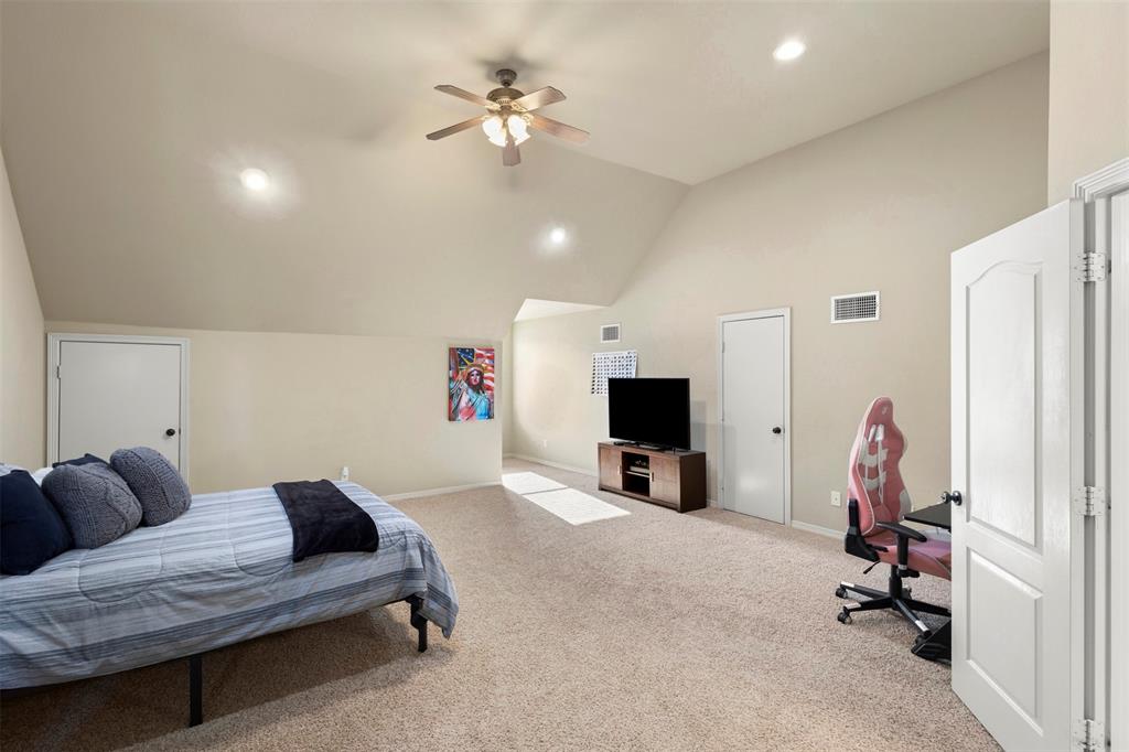 105 Country Ridge Court Red Oak, TX 75154 - Photo 29 of 40 a view of a livingroom with workspace and a couch
