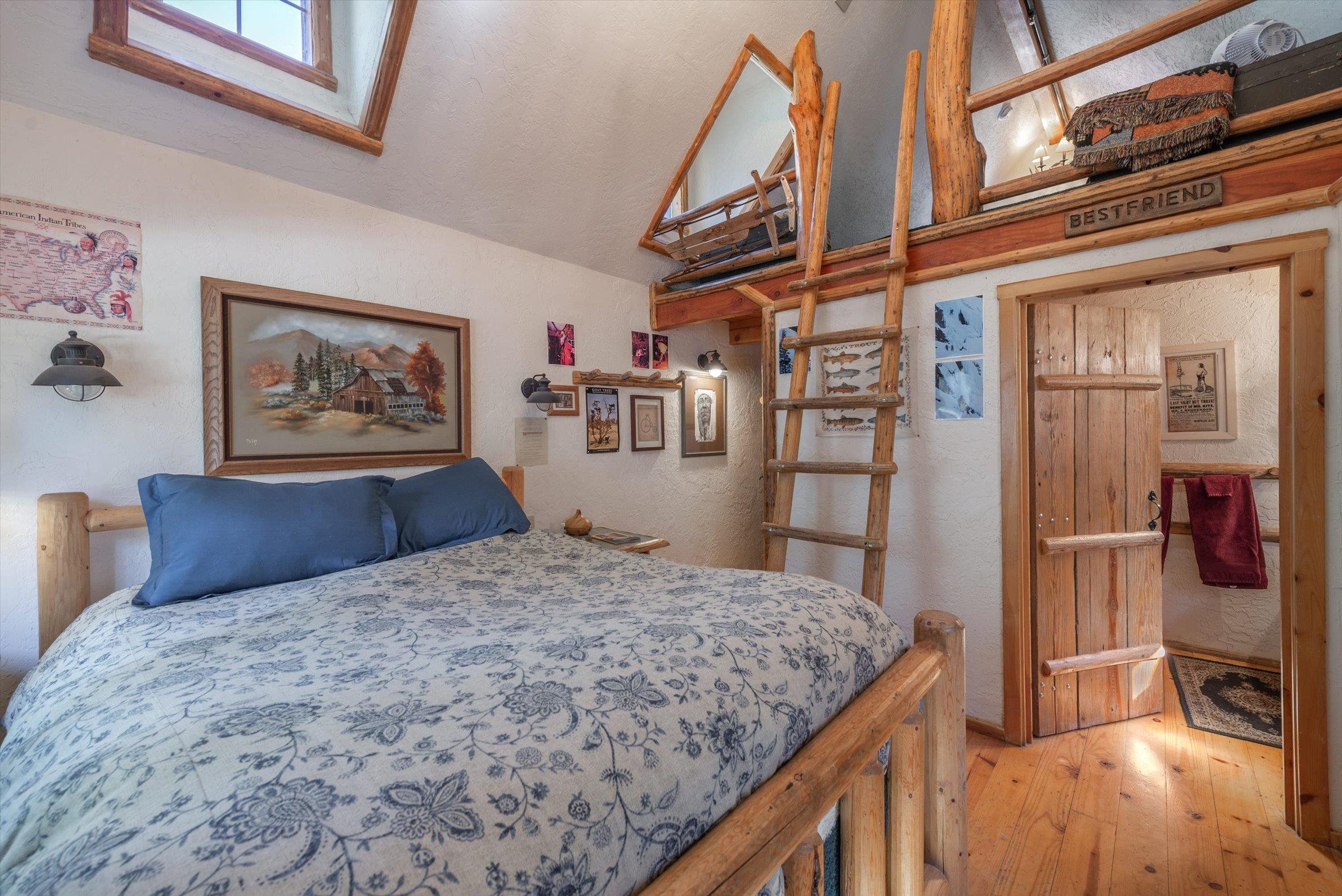 8600 Cold Stream Road Truckee, CA 96161 - Photo 11 of 28 a bedroom with a large bed and a dresser