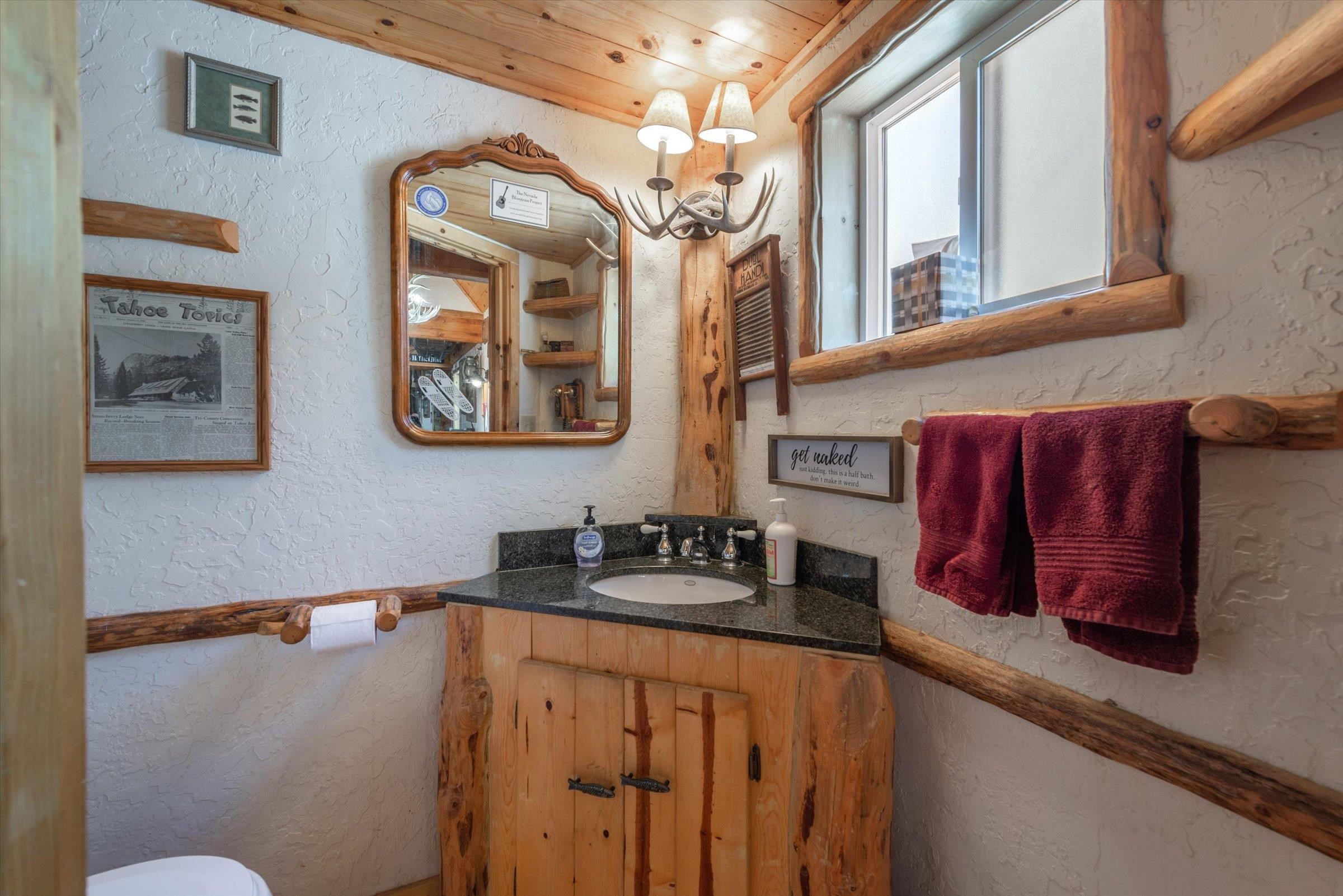 8600 Cold Stream Road Truckee, CA 96161 - Photo 22 of 28 a bathroom with a sink mirror and vanity