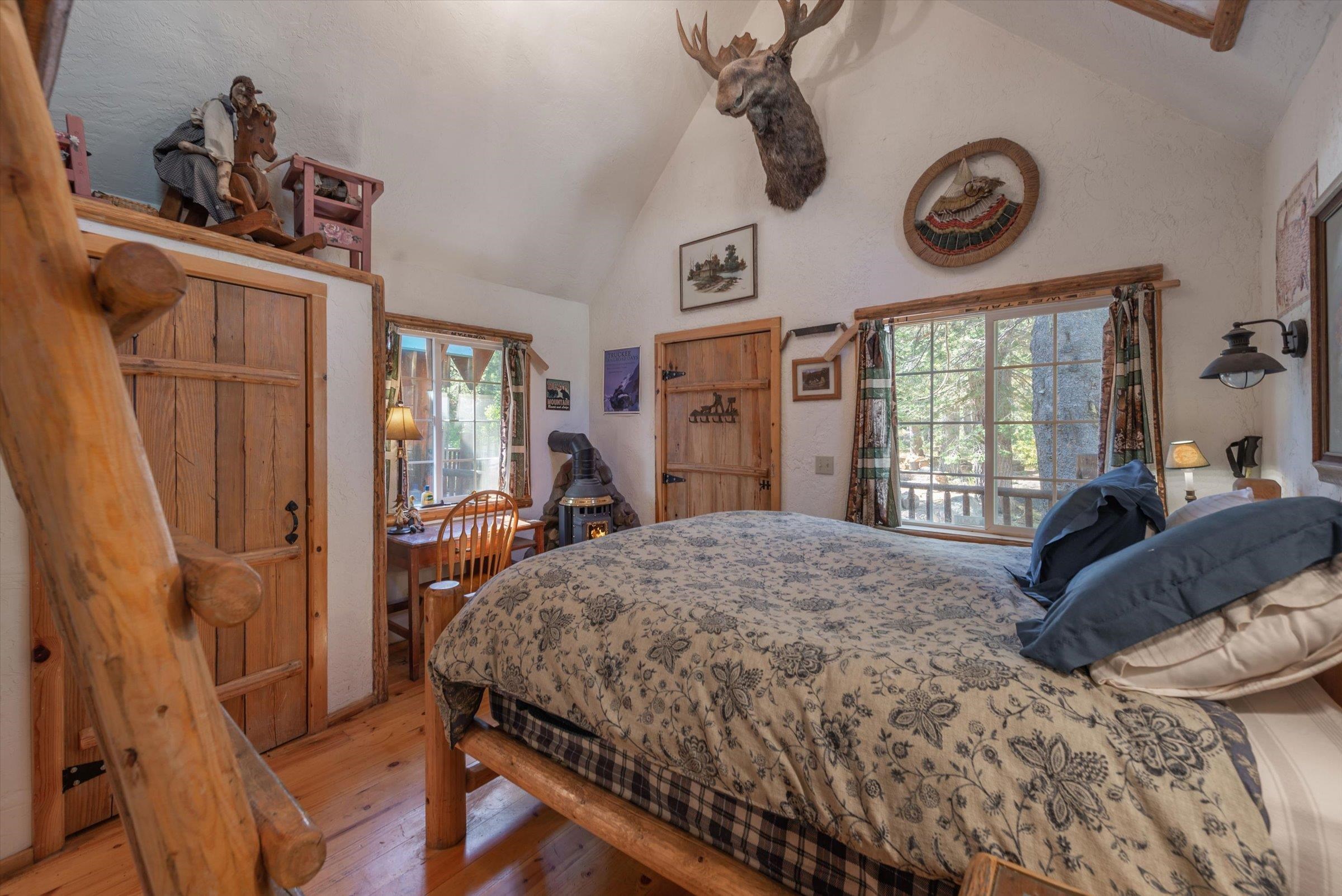 8600 Cold Stream Road Truckee, CA 96161 - Photo 10 of 28 a bedroom with a bed and a window