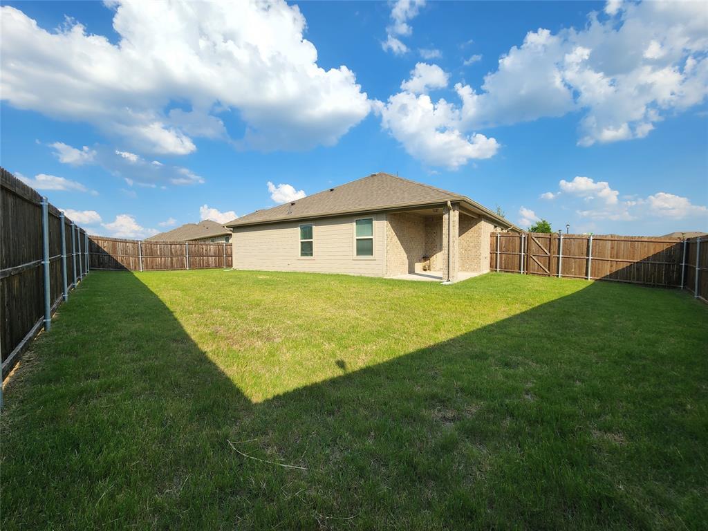 924 Amber Street Princeton, TX 75407 - Photo 8 of 19 Backyard