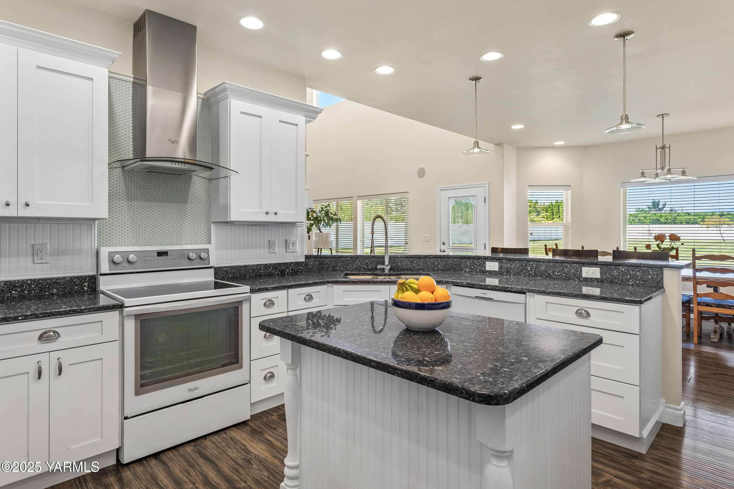 11906 Zier Road Yakima, WA 98908 - Photo 15 of 67 a kitchen with stainless steel appliances granite countertop a sink a stove and a counter space