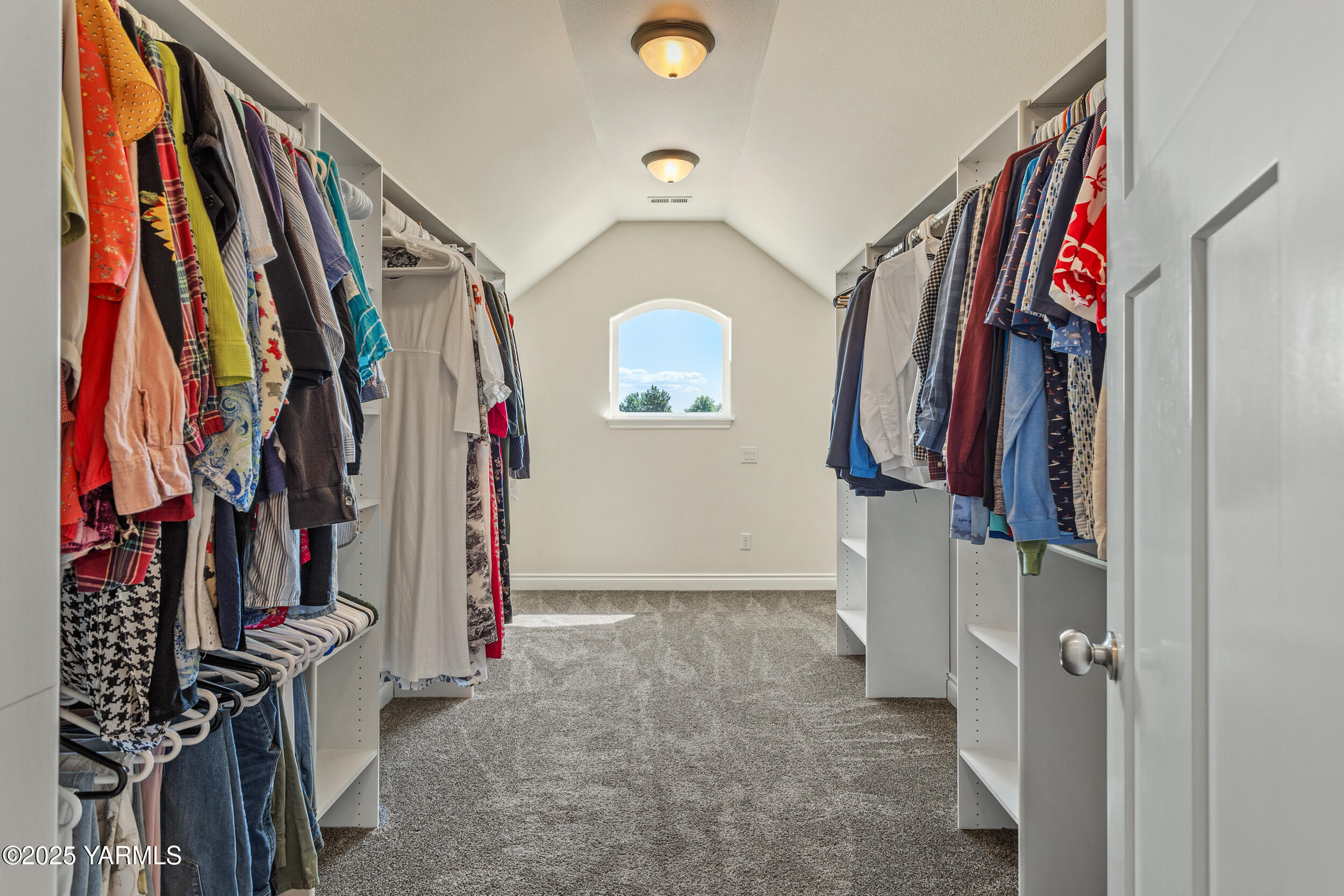 11906 Zier Road Yakima, WA 98908 - Photo 35 of 67 a view of walk in closet with clothes and shoes