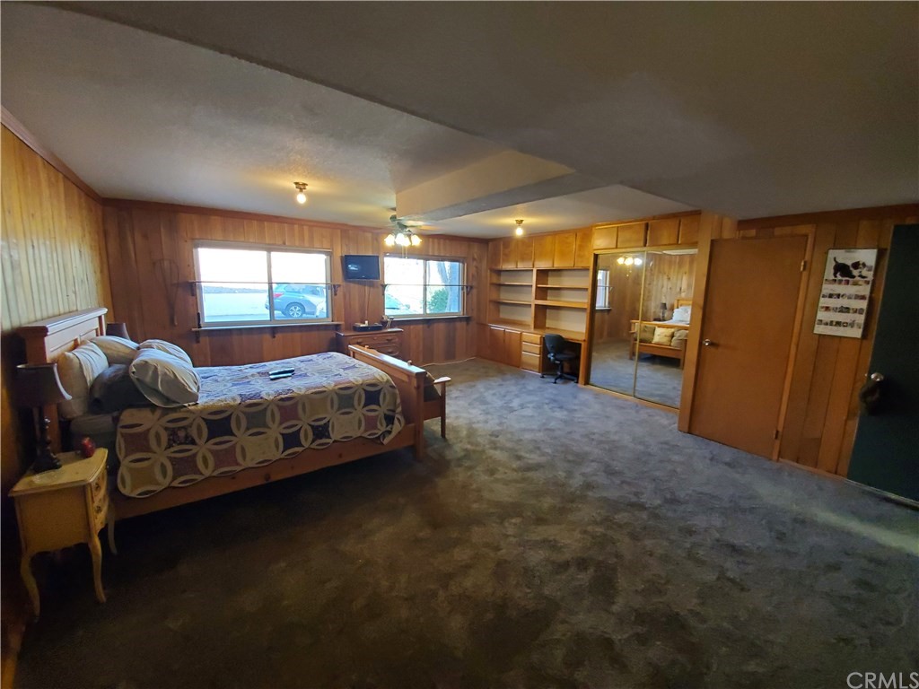 8260 Weirick Road Corona, CA 92883 - Photo 15 of 40 a bedroom with bed and window