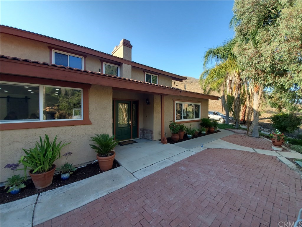 8260 Weirick Road Corona, CA 92883 - Photo 20 of 40 a view of a house with a patio