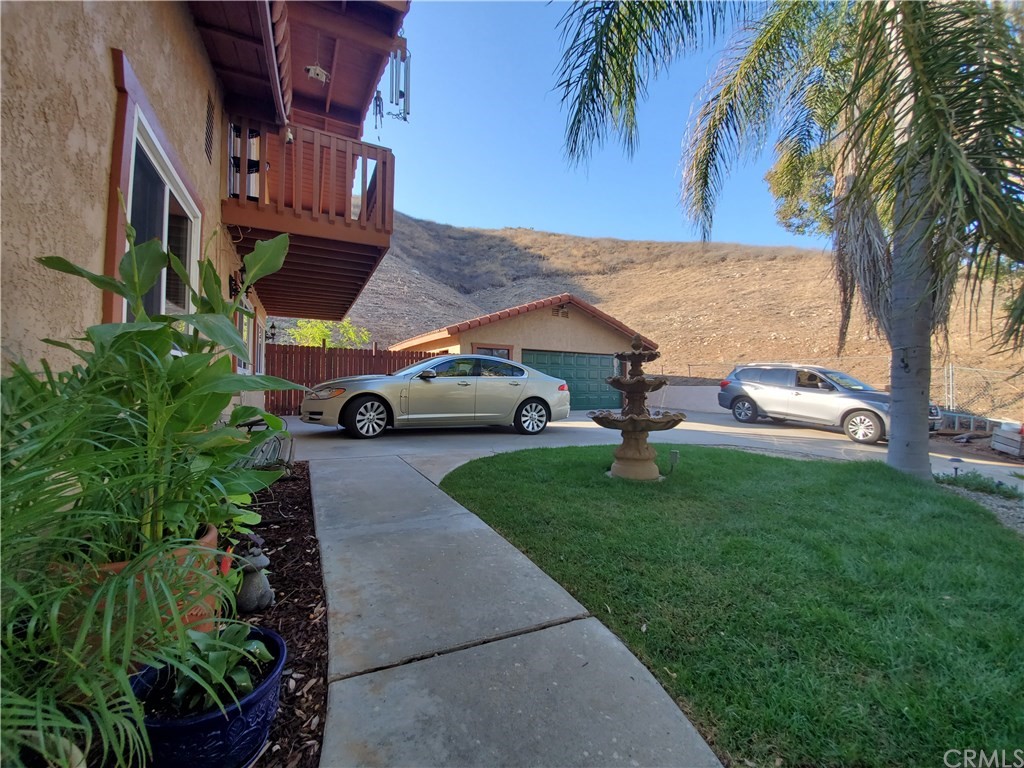 8260 Weirick Road Corona, CA 92883 - Photo 21 of 40 a house view with a garden space