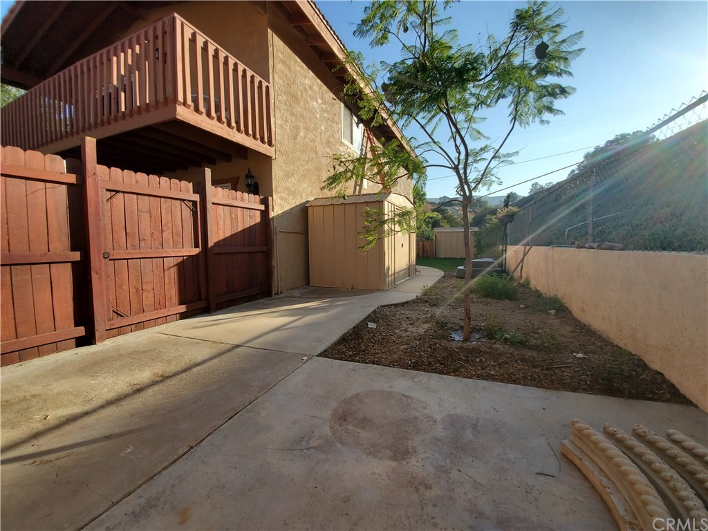 8260 Weirick Road Corona, CA 92883 - Photo 26 of 40 a front view of a house with a yard