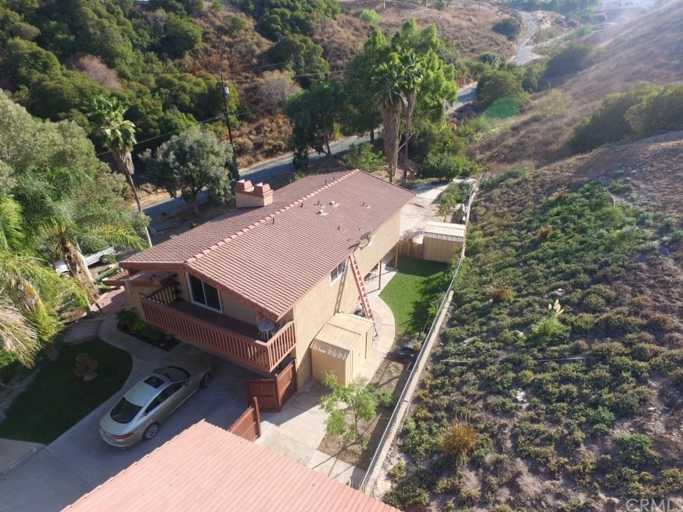 8260 Weirick Road Corona, CA 92883 - Photo 35 of 40 an aerial view of a house with a yard