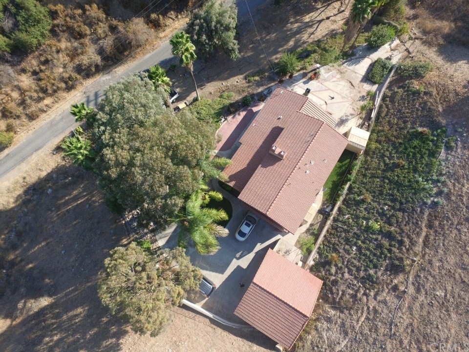8260 Weirick Road Corona, CA 92883 - Photo 36 of 40 an aerial view of a house with a yard