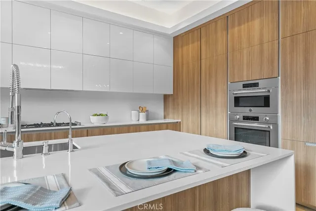 a bed room with furniture and a large window