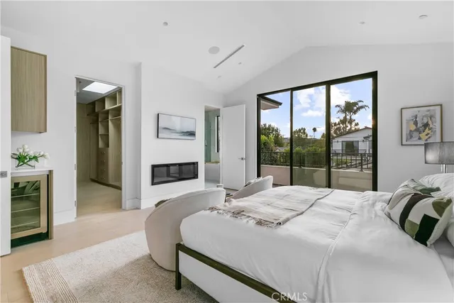 a bathroom with a tub sink shower and mirror