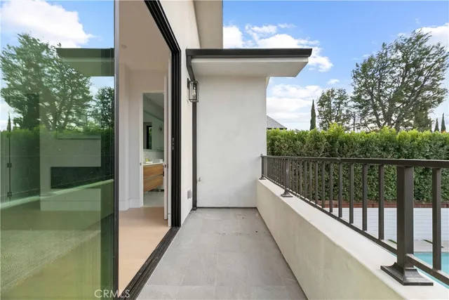 a kitchen with a table and chairs in it