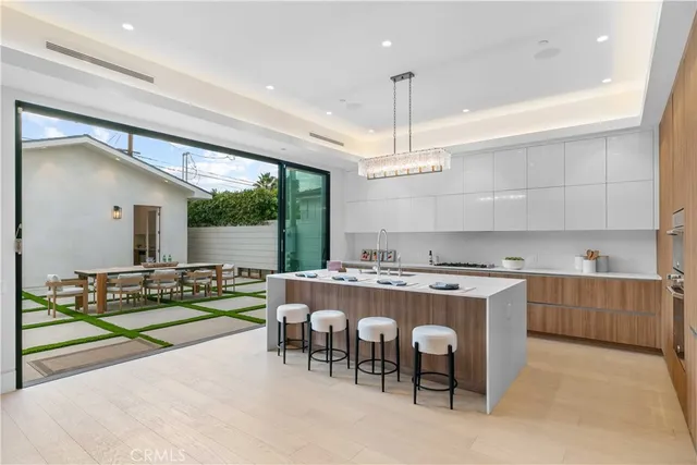 a patio with a table and chairs