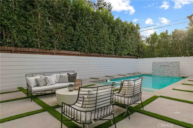 a backyard of a house with seating space