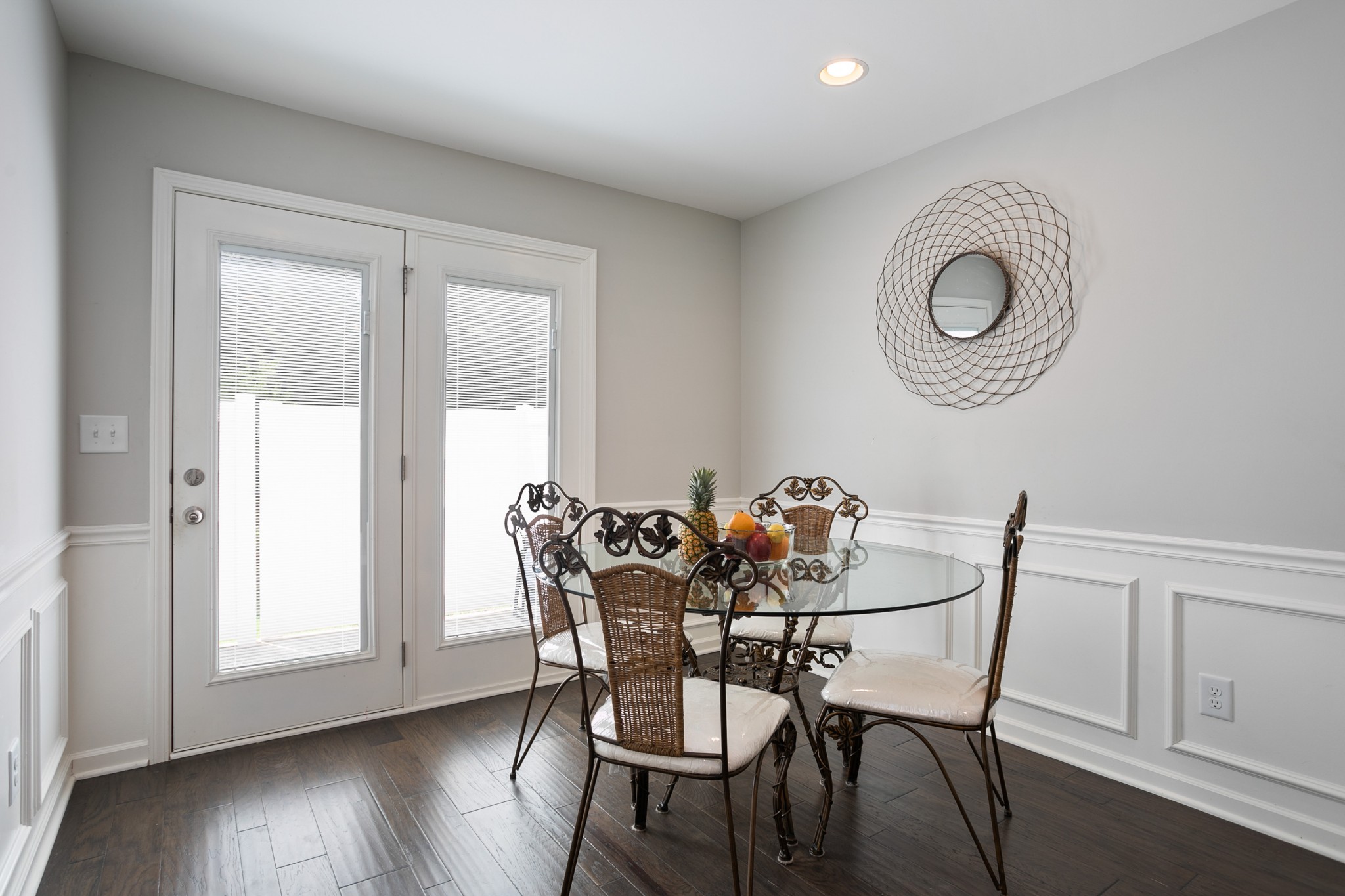 1076 Neeleys Bend East Spring Hill, TN 37174 - Photo 11 of 27 a dining room with furniture and wooden floor