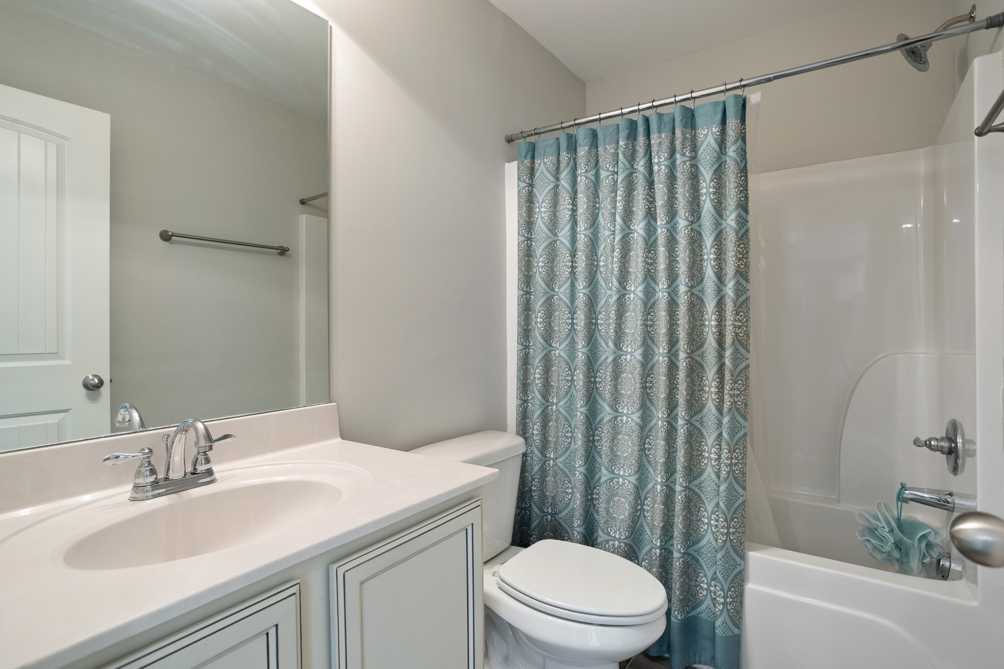 1076 Neeleys Bend East Spring Hill, TN 37174 - Photo 13 of 27 a bathroom with a sink toilet and shower