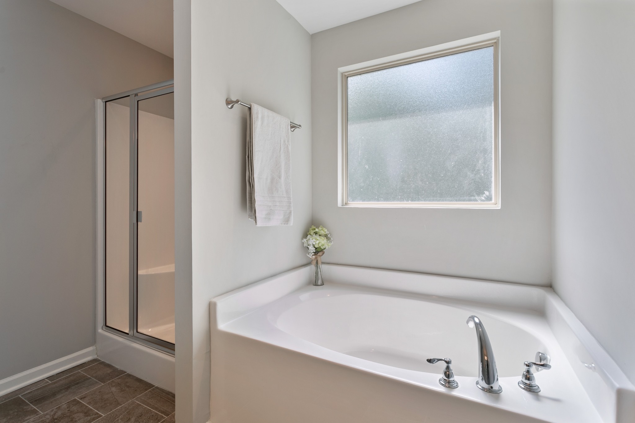 1076 Neeleys Bend East Spring Hill, TN 37174 - Photo 20 of 27 a bathroom with a tub and a shower