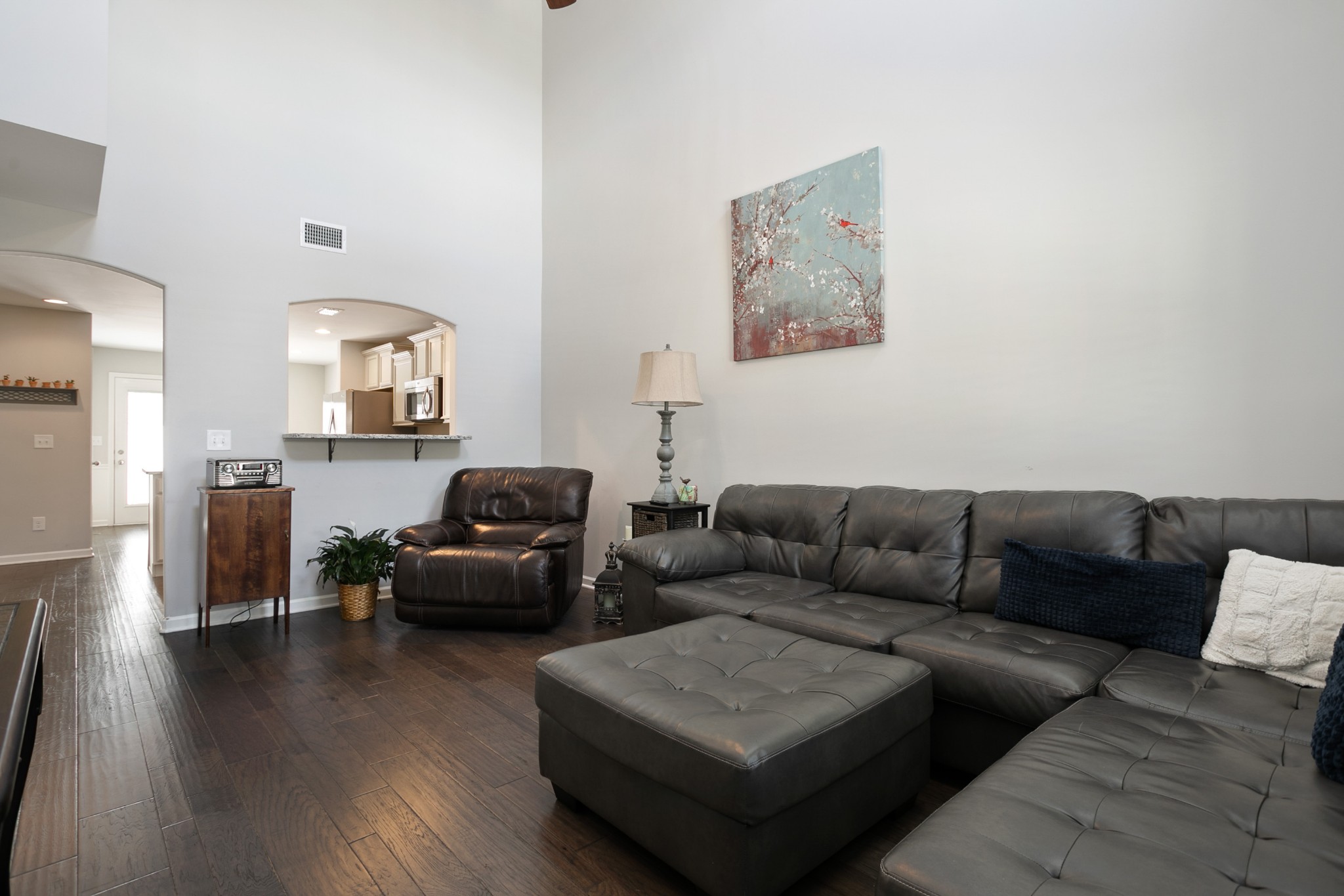 1076 Neeleys Bend East Spring Hill, TN 37174 - Photo 4 of 27 a living room with furniture and a wooden floor
