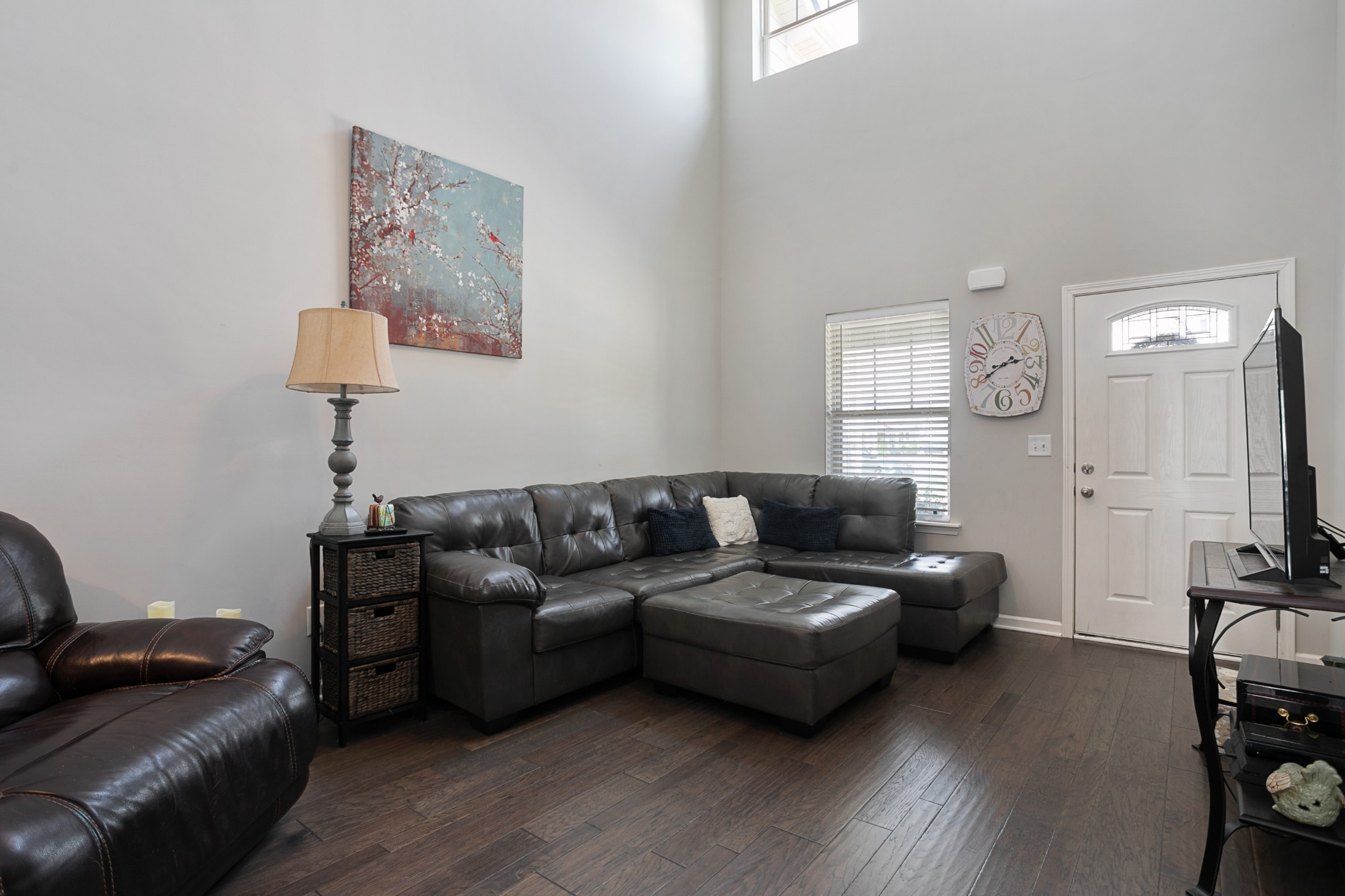 1076 Neeleys Bend East Spring Hill, TN 37174 - Photo 5 of 27 a living room with furniture and a flat screen tv