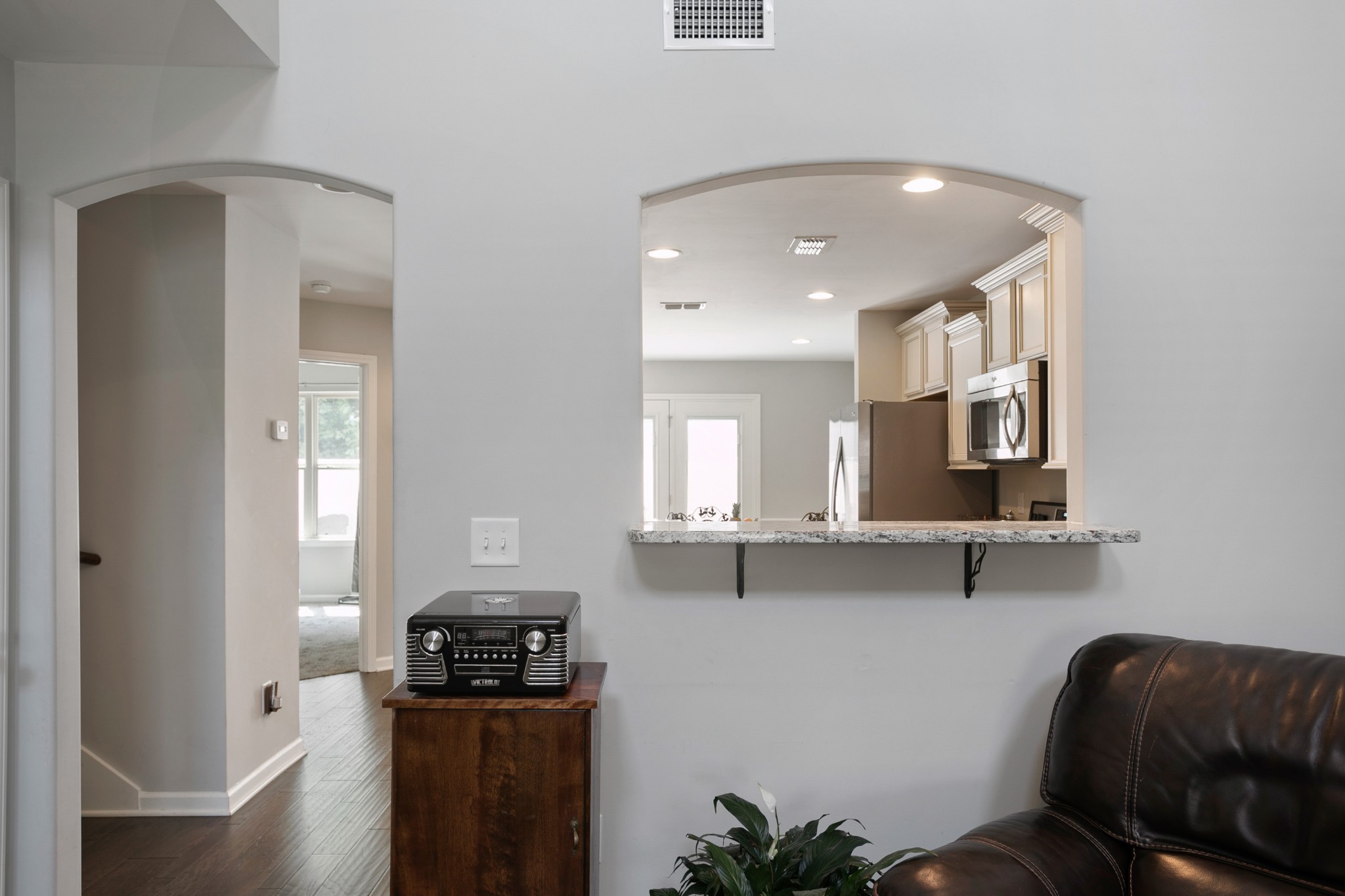 1076 Neeleys Bend East Spring Hill, TN 37174 - Photo 6 of 27 a kitchen with stainless steel appliances a refrigerator and a stove