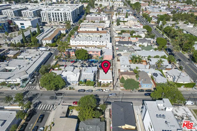 an aerial view of residential building and street